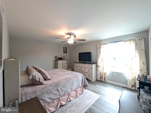 513 Dakemich Ct, Enola, PA 17025 - bedroom featuring light wood-style flooring, a ceiling fan, and baseboards