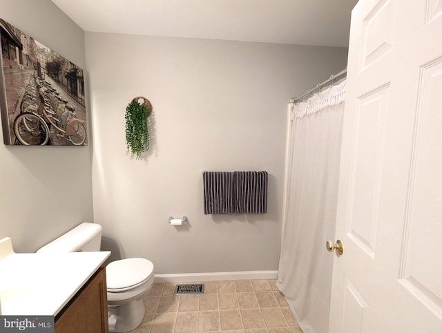 513 Dakemich Ct, Enola, PA 17025 - full bathroom featuring vanity, toilet, baseboards, and tile patterned floors