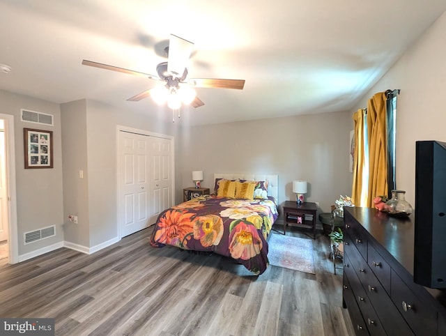 513 Dakemich Ct, Enola, PA 17025 - bedroom featuring dark wood-type flooring, a closet, baseboards, and ceiling fan