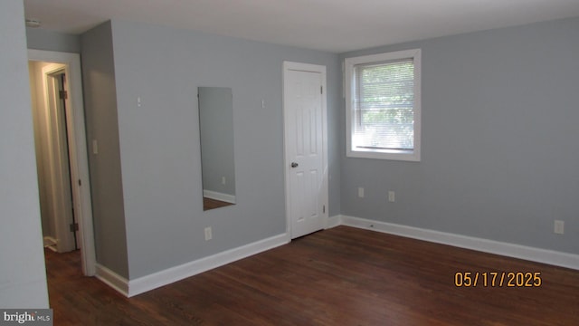 5901 Taylor Rd, Riverdale, MD 20737 - unfurnished room featuring wood finished floors, baseboards, and a smoke detector