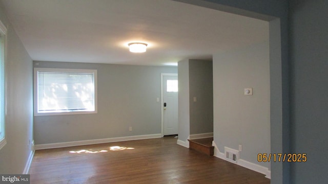 5901 Taylor Rd, Riverdale, MD 20737 - empty room with wood finished floors and baseboards