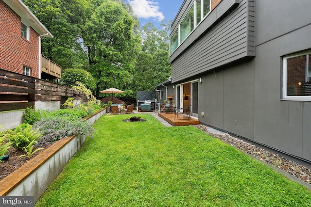 5929 Onondaga Rd, Bethesda, MD 20816 - view of yard featuring an outdoor hangout area and a deck