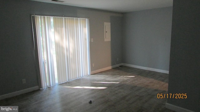 4102 Parkwood Ct, Brentwood, MD 20722 - empty room featuring wood finished floors, electric panel, and baseboards