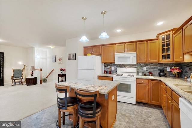 4 Hardy Ct, Lancaster, PA 17602 - kitchen with white appliances, brown cabinetry, decorative backsplash, glass insert cabinets, and light stone counters