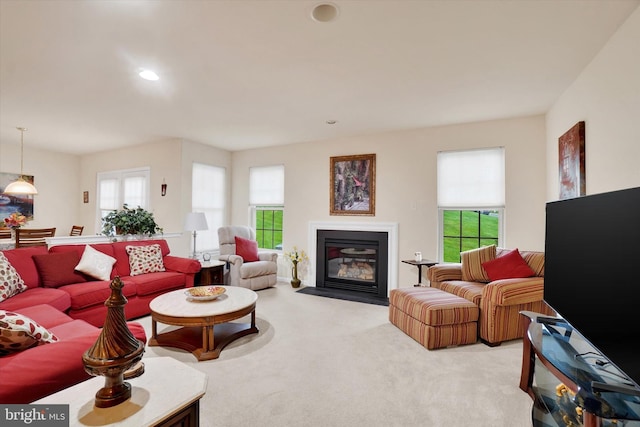 4 Hardy Ct, Lancaster, PA 17602 - living area with plenty of natural light, light carpet, a fireplace with flush hearth, and recessed lighting