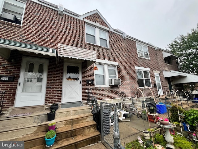 4557 Oakmont St, Philadelphia, PA 19136 - view of front of house featuring brick siding, entry steps, and cooling unit