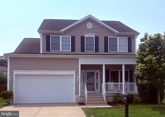 10 Everglades Ln, Stafford, VA 22554 - view of front of home with concrete driveway, a porch, and roof with shingles