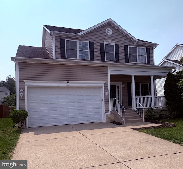 10 Everglades Ln, Stafford, VA 22554 - traditional-style home featuring driveway, covered porch, and a garage