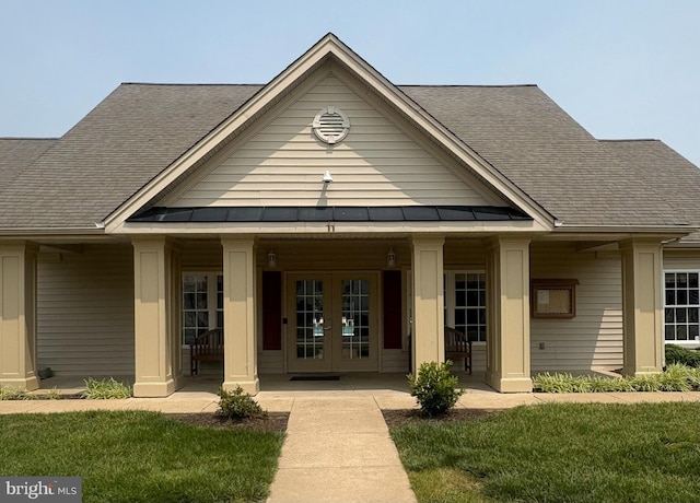 10 Everglades Ln, Stafford, VA 22554 - view of front of property with french doors, roof with shingles, and a front yard