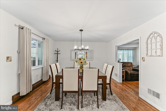 320 Lees Brg, Nottingham, PA 19362 - dining area featuring wood finished floors, a chandelier, and plenty of natural light