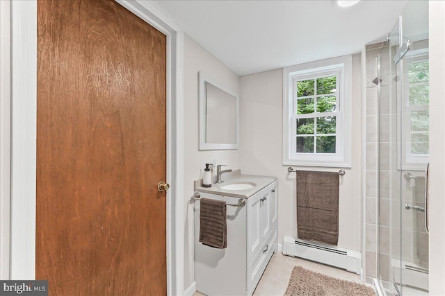 320 Lees Brg, Nottingham, PA 19362 - bathroom with a baseboard heating unit, vanity, tiled shower, and tile patterned floors