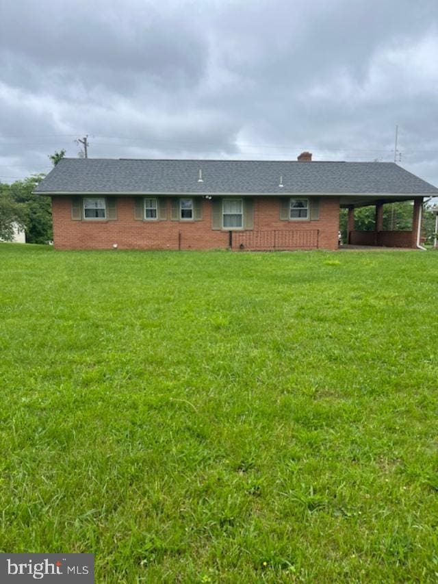 421 Superior Ave, Winchester, VA 22601 - rear view of property with a yard, brick siding, and roof with shingles