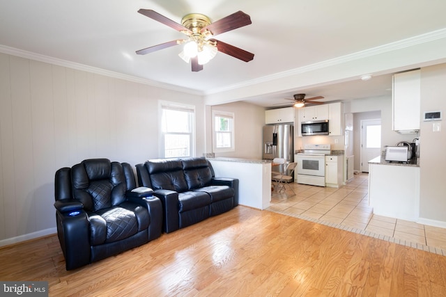 143 Baker St, Manassas Park, VA 20111 - living area with ceiling fan, ornamental molding, healthy amount of natural light, and light wood finished floors