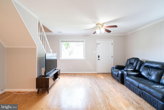 143 Baker St, Manassas Park, VA 20111 - living area featuring a ceiling fan, wood finished floors, ornamental molding, baseboards, and stairway