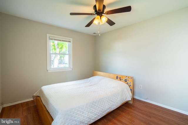 143 Baker St, Manassas Park, VA 20111 - bedroom featuring wood finished floors, baseboards, and a ceiling fan