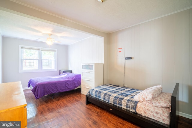 143 Baker St, Manassas Park, VA 20111 - bedroom with crown molding, wood finished floors, and ceiling fan