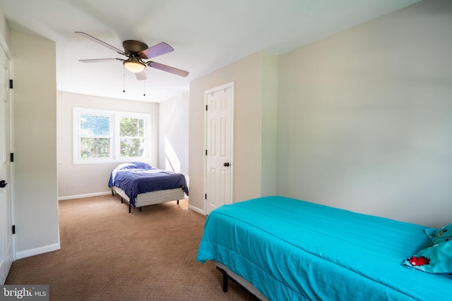143 Baker St, Manassas Park, VA 20111 - bedroom with baseboards, carpet flooring, and ceiling fan