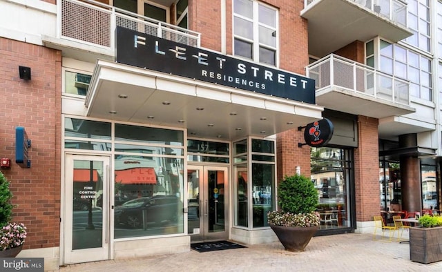 157 Fleet Unit 307, Oxon Hill, MD 20745 - doorway to property featuring brick siding