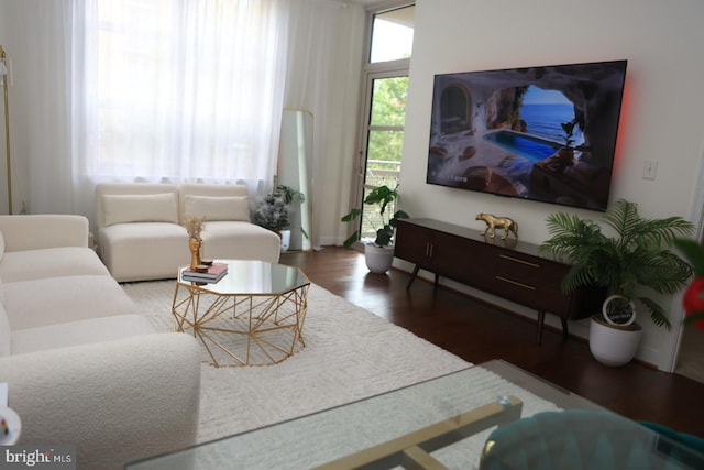 157 Fleet Unit 307, Oxon Hill, MD 20745 - living room with wood finished floors and baseboards