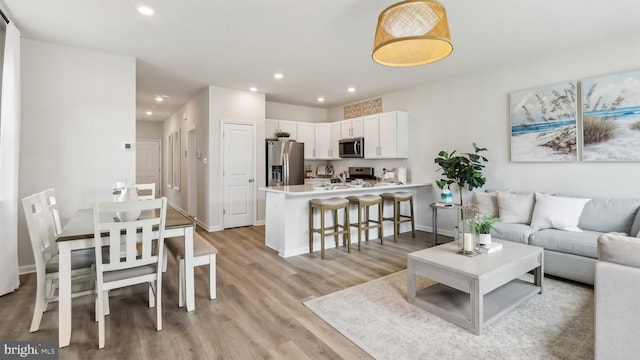 210 Bentz Ave, Villas, NJ 08251 - living area featuring light wood-style floors, recessed lighting, and baseboards