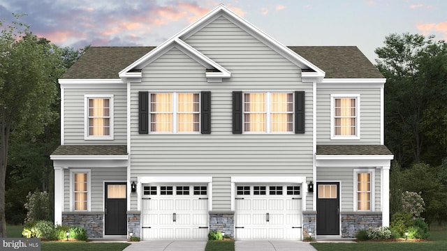 210 Bentz Ave, Villas, NJ 08251 - traditional-style house with a garage, roof with shingles, concrete driveway, and stone siding