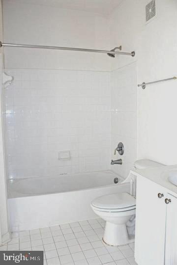 6212 Westchester Park Dr Unit J, College Park, MD 20740 - full bathroom featuring vanity, tub / shower combination, toilet, and tile patterned flooring