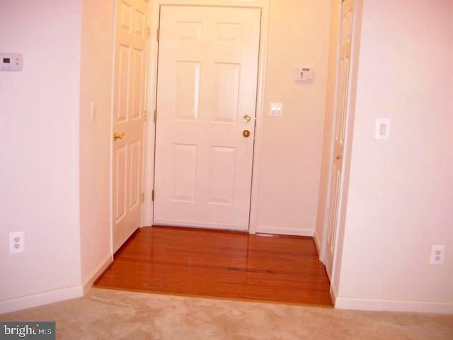 6212 Westchester Park Dr Unit J, College Park, MD 20740 - hallway featuring baseboards