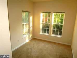 6212 Westchester Park Dr Unit J, College Park, MD 20740 - unfurnished room with baseboards and carpet floors