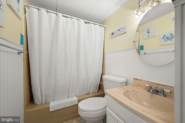 13 60th St Unit 201, Ocean City, MD 21842 - full bathroom featuring vanity, wainscoting, toilet, and shower / bath combination with curtain