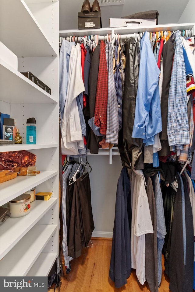 42026 Zircon Dr, Aldie, VA 20105 - walk in closet featuring wood finished floors
