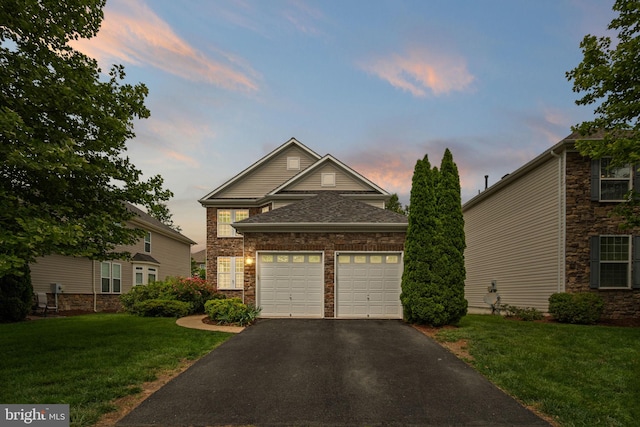 42026 Zircon Dr, Aldie, VA 20105 - traditional home featuring asphalt driveway, a front lawn, an attached garage, stone siding, and a shingled roof