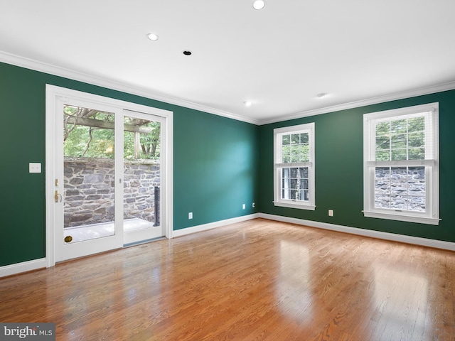 2000 N Bancroft Pkwy, Wilmington, DE 19806 - spare room with baseboards, ornamental molding, wood finished floors, and recessed lighting