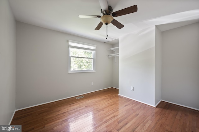 1100 Clarke St, Herndon, VA 20170 - unfurnished bedroom featuring wood finished floors, a closet, baseboards, and ceiling fan