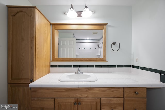 1100 Clarke St, Herndon, VA 20170 - bathroom featuring vanity and a shower