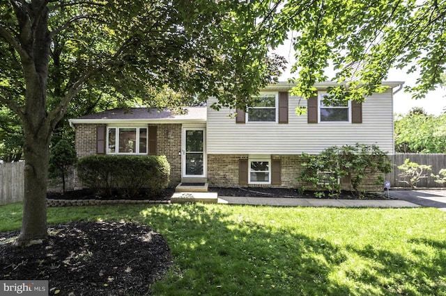 1100 Clarke St, Herndon, VA 20170 - split level home featuring brick siding
