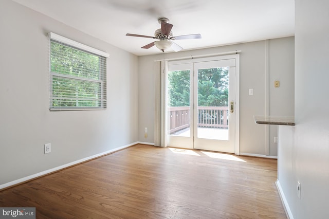 1100 Clarke St, Herndon, VA 20170 - unfurnished room featuring a ceiling fan, wood finished floors, and baseboards