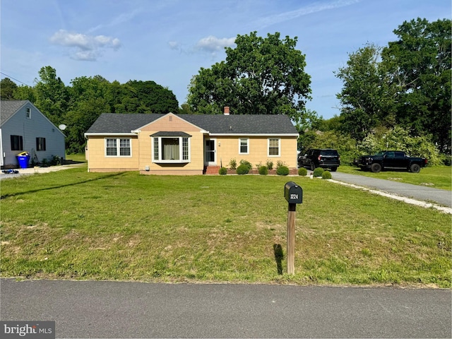 1224 Barney Jenkins Rd, Felton, DE 19943 - ranch-style house with a front lawn, a shingled roof, and asphalt driveway