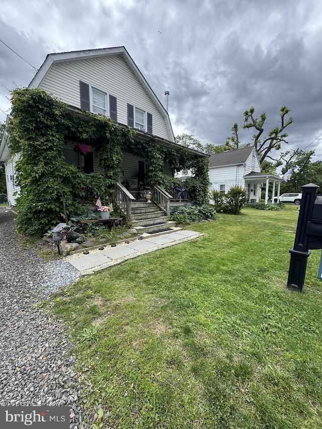 32 Jacobstown Rd, New Egypt, NJ 08533 - view of grassy yard with covered porch