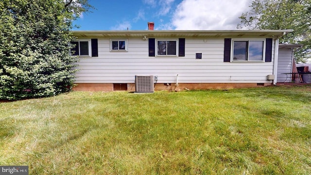35 Bayberry Rd, Ewing, NJ 08618 - back of house with a yard, central AC, and a chimney