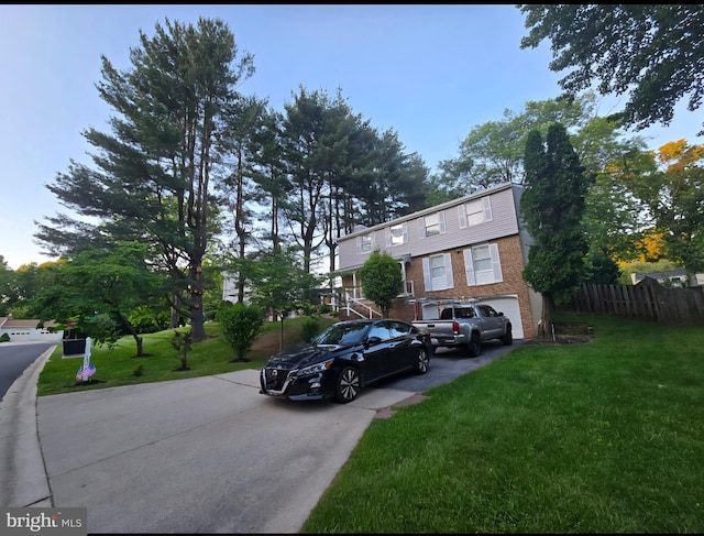 13721 Hobart Dr, Silver Spring, MD 20904 - view of front of property with brick siding, driveway, and an attached garage