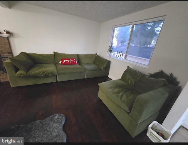 13721 Hobart Dr, Silver Spring, MD 20904 - living area featuring wood finished floors and a textured ceiling