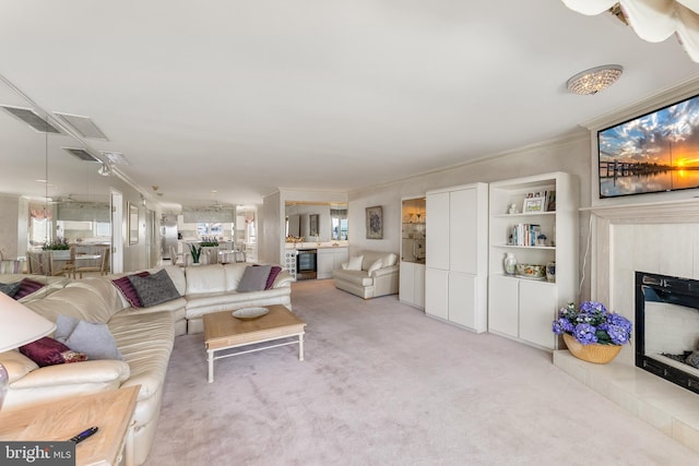 1368 Boardwalk Unit B, Ocean City, NJ 08226 - living room with beverage cooler, a fireplace, light carpet, and ornamental molding