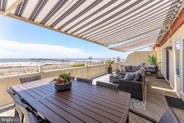 1368 Boardwalk Unit B, Ocean City, NJ 08226 - deck with outdoor dining area, an outdoor living space, and a water view