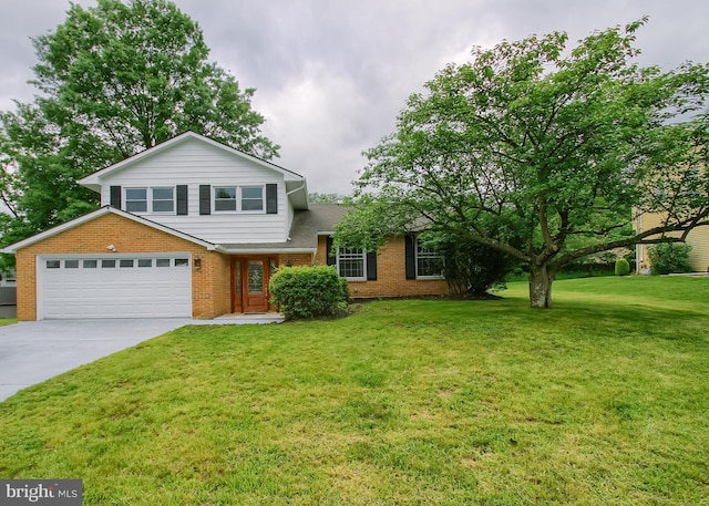 3900 Mark Ave, Harrisburg, PA 17110 - split level home featuring brick siding, concrete driveway, and a front yard