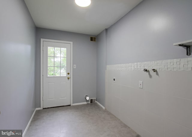 3900 Mark Ave, Harrisburg, PA 17110 - doorway to outside featuring baseboards