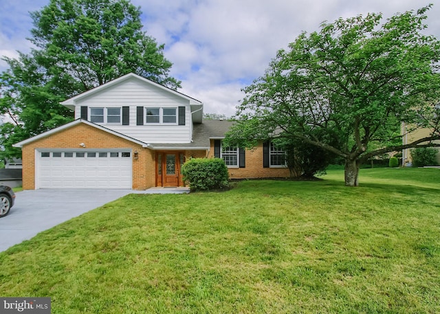 3900 Mark Ave, Harrisburg, PA 17110 - tri-level home featuring brick siding, concrete driveway, a front yard, and an attached garage