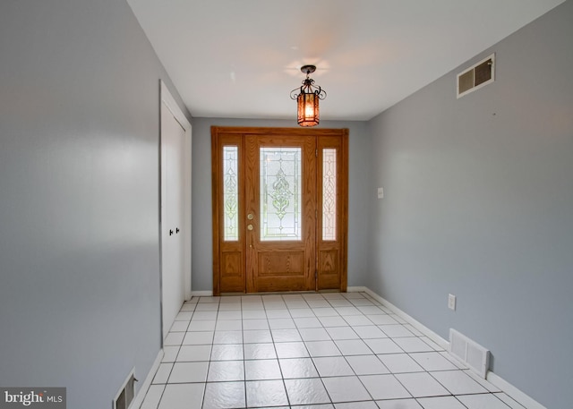 3900 Mark Ave, Harrisburg, PA 17110 - foyer entrance with baseboards and light tile patterned floors