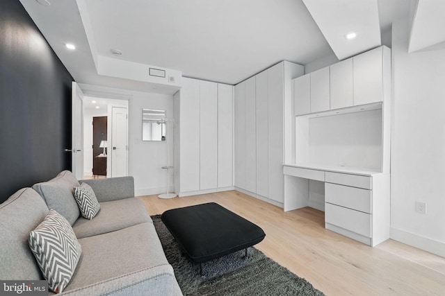 1111 19th St N Unit 2108, Arlington, VA 22209 - living room with light wood finished floors, recessed lighting, and baseboards