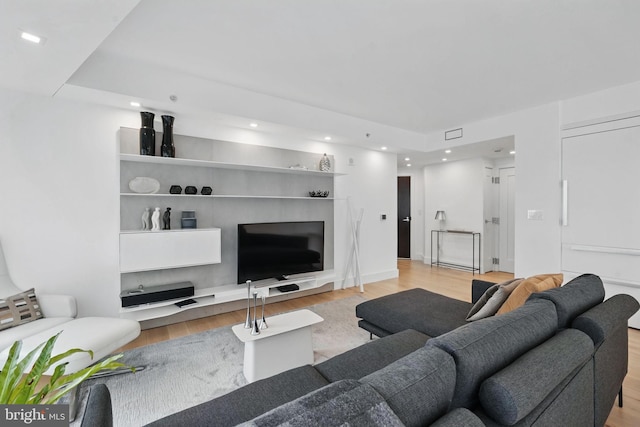 1111 19th St N Unit 2108, Arlington, VA 22209 - living area featuring light wood-style floors and recessed lighting