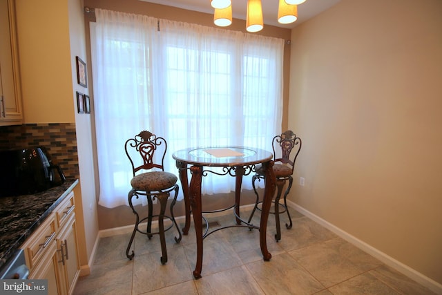 1300 Park Garden Ln, Reston, VA 20194 - dining area with baseboards and light tile patterned floors